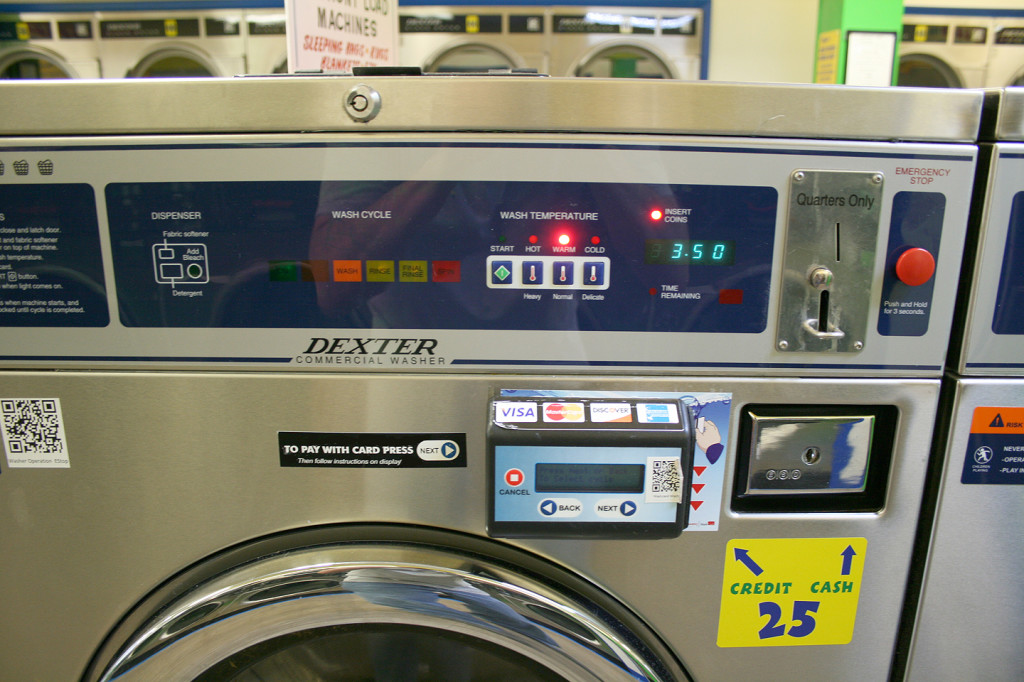 Credit card reader on washing machine. 24 hour laundromat in Iowa