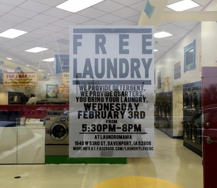 Free Laundry Sign in Laundromat Window