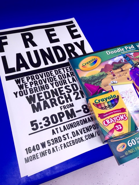 Promotional signage for March Free Laundry Event