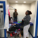 Mother and children at Free Laundry Event on Wednesday March 2nd at Laundromania in Davenport, Iowa