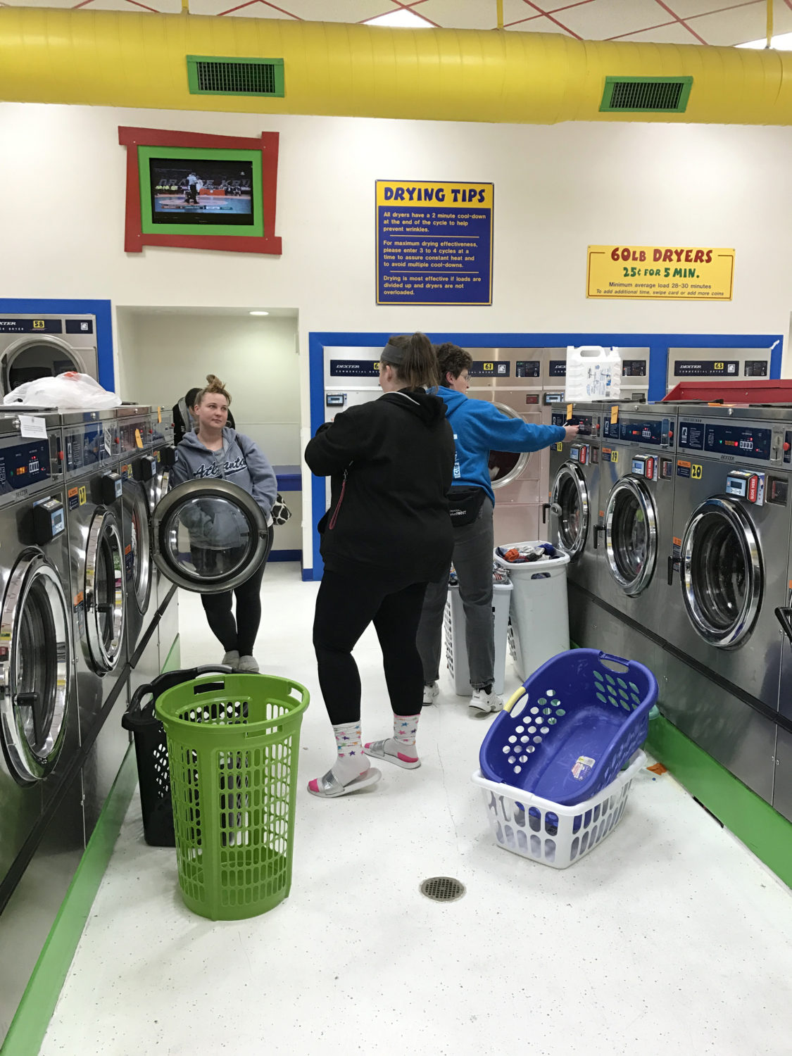 People Doing Laundry At Laundry Love QC Event At Laundromania In Davenport Iowa Hour