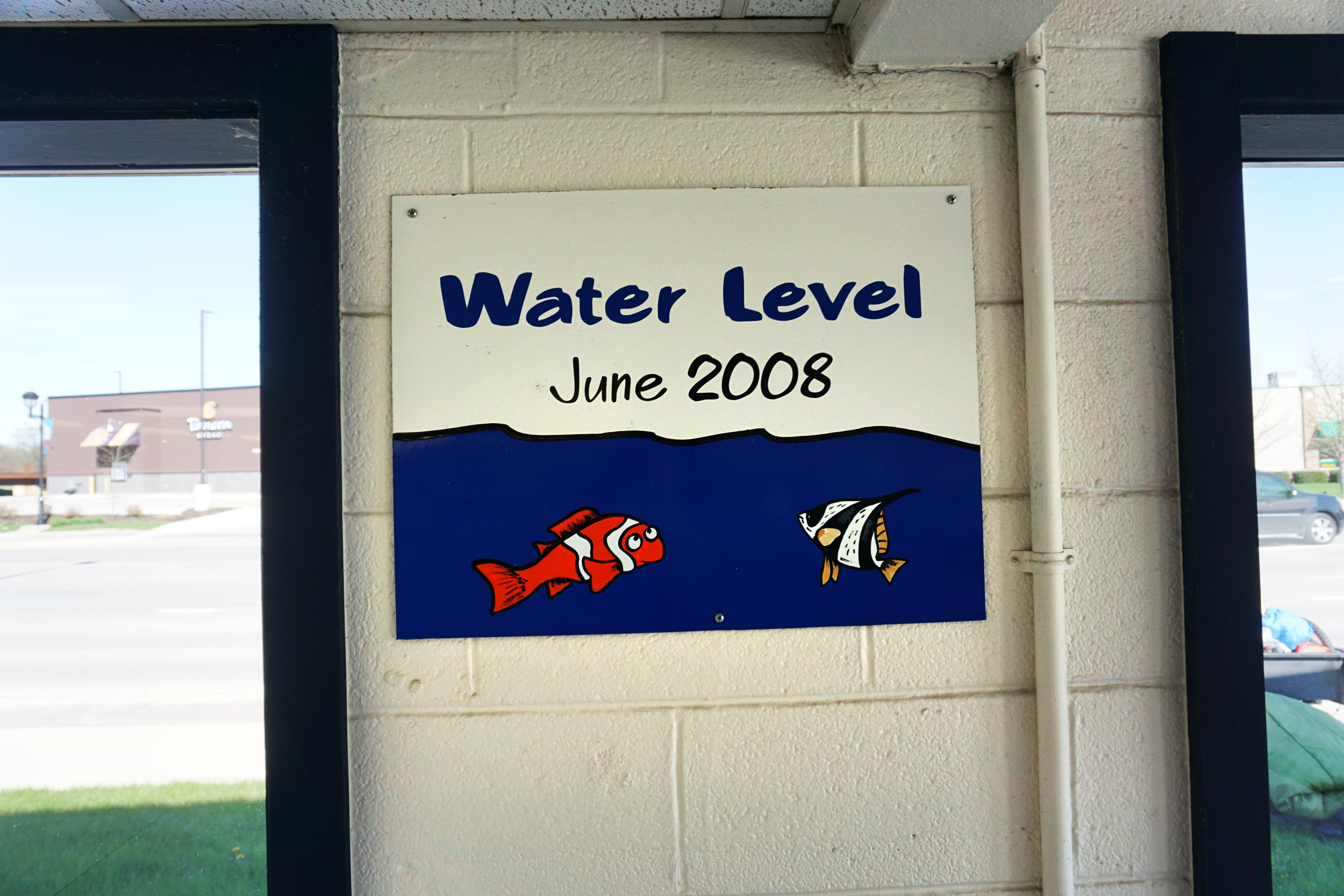 water-level-sign-for-2008-flood-inside-laundromat-24-hour-laundromat