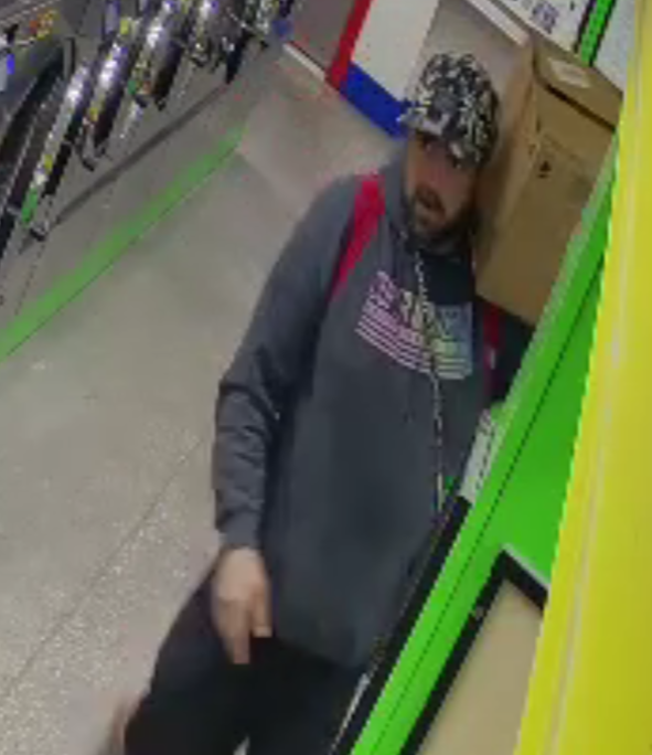 Wanted for theft at Laundromania in Downtown Iowa City (Oct 2021)