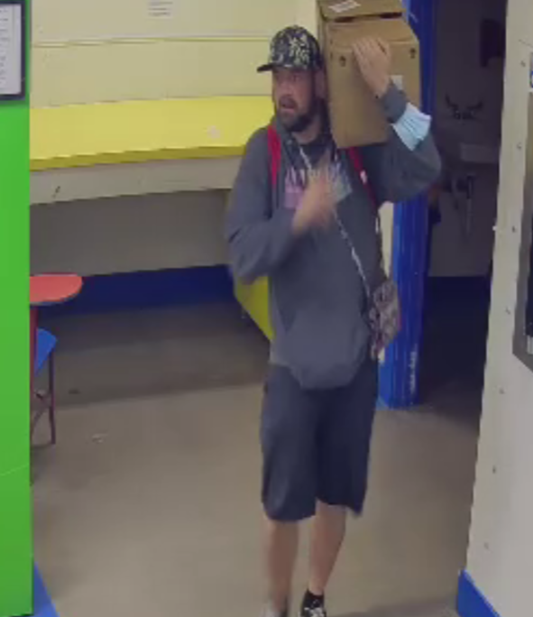 Wanted for theft at Laundromania in Downtown Iowa City (Oct 2021)